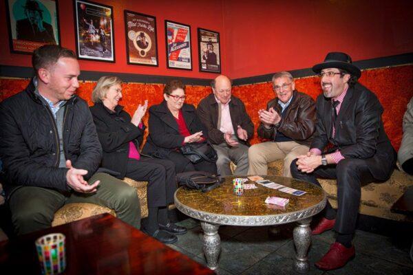 Jay Alexander meets his audience at a pre-show in which he performs card tricks. (Courtesy of Marrakech Magic Theater)