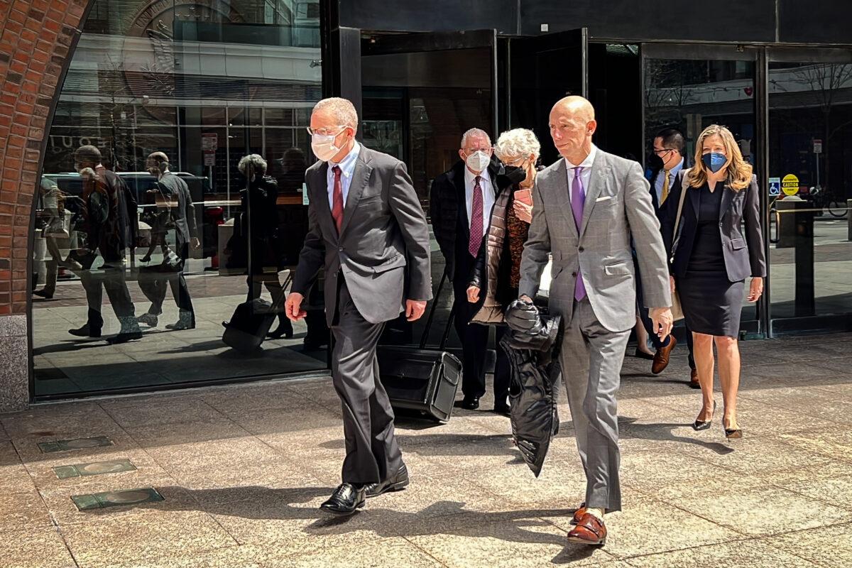 Charles Lieber (L) and his lawyer, Marc Mukasey, exit the John Joseph Moakley U.S. Courthouse in Boston on April 26, 2023. (Learner Liu/The Epoch Times)