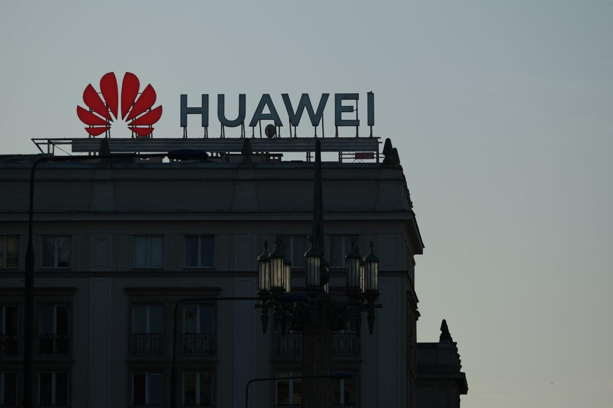 A sign advertising Chinese telecoms equipment manufacturer Huawei stands on an apartment building on Oct. 11, 2019, in Warsaw, Poland. (Sean Gallup/Getty Images)