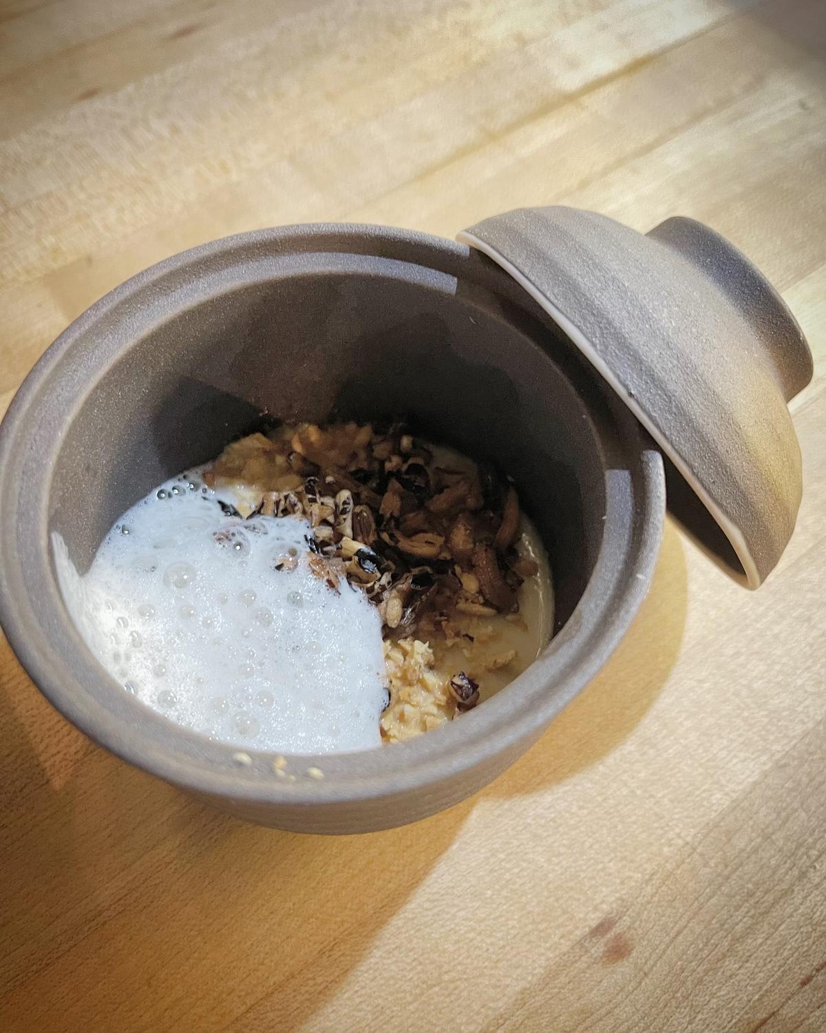 Sea truffle chawanmushi with toasted peanuts, puffed wild rice, and ginger-peanut cream sauce. (Courtesy of Stages at One Washington)
