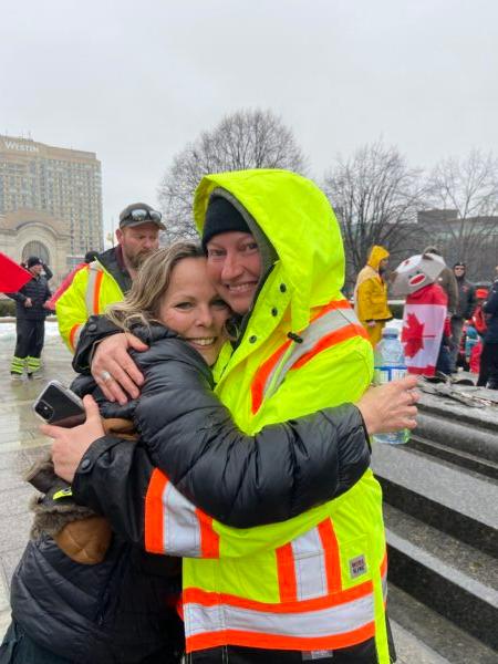 Freedom Convoy organizer Tamara Lich hugs a supporter during the protest in Ottawa in February 2022. (Courtesy of Tamara Lich)