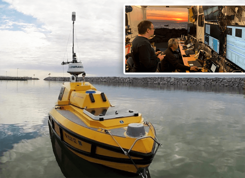 Autonomous surface vessel BEN pictured in the Rogers City Marina. (Courtesy of Ocean Exploration Trust/NOAA Thunder Bay National Marine Sanctuary); (Inset) Researchers from the University of New Hampshire’s Center for Coastal and Ocean Mapping operate ASV BEN from the mobile lab in Rogers City, Michigan. (Courtesy of Ocean Exploration Trust/NOAA Thunder Bay National Marine Sanctuary).