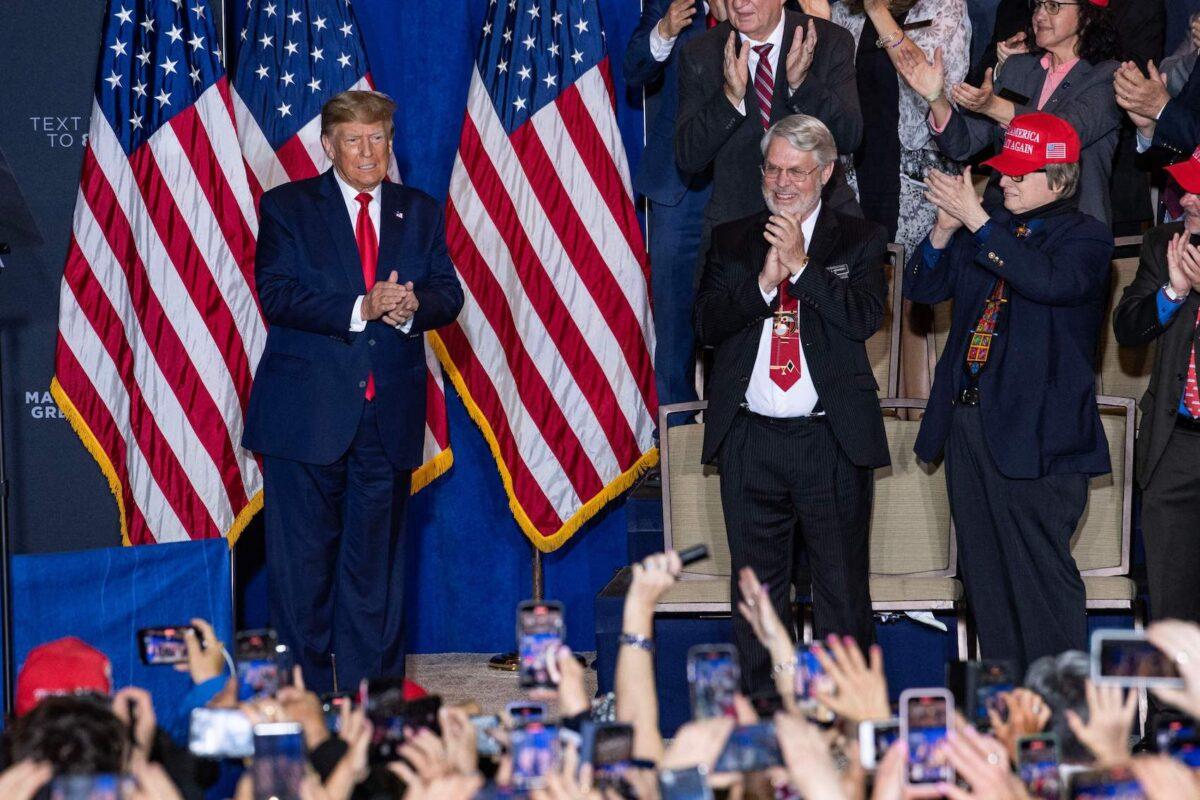 Former U.S. President Donald Trump stands onstage during a Make America Great Again rally in Manchester, N.H., on April 27, 2023. (Joseph Prezioso/AFP via Getty Images)
