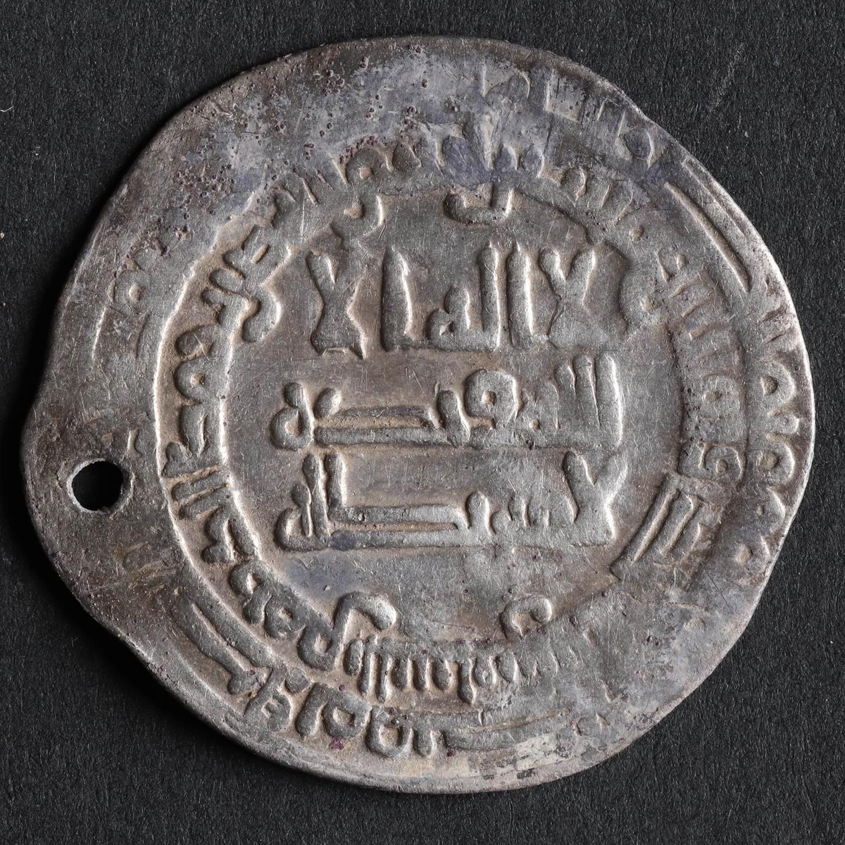One of the few Arabic coins from one of the hoards; most of these the Vikings cut into pieces. (Photos from Nordjyske Museer, Denmark)