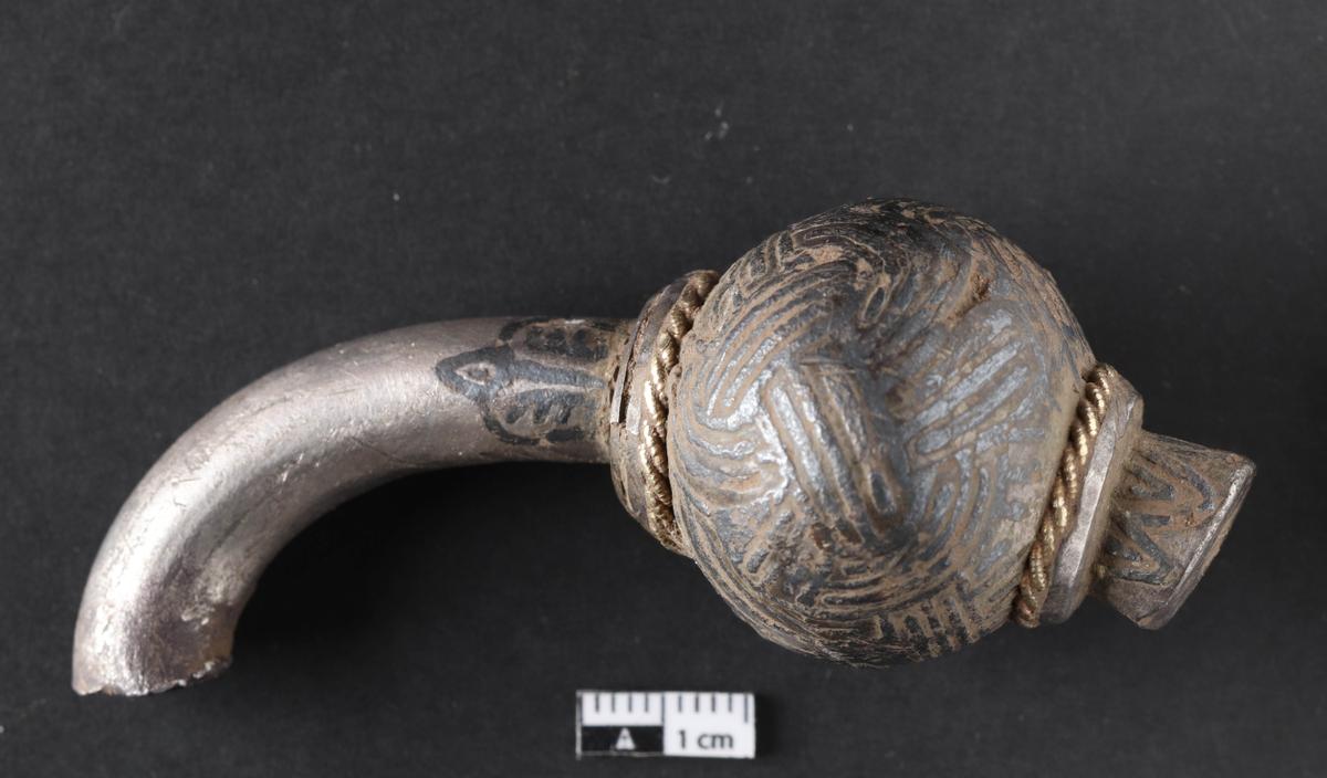 One of two end buds from a silver ring pin. (Photos from Nordjyske Museer, Denmark)