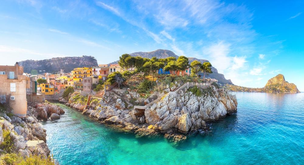 The picturesque fishing village of Sant'Elia is one of the stereotypical stop-offs from Palermo toward Cefalù, which lies about 44 miles to the east. (Vadym Lavra/Shutterstock)