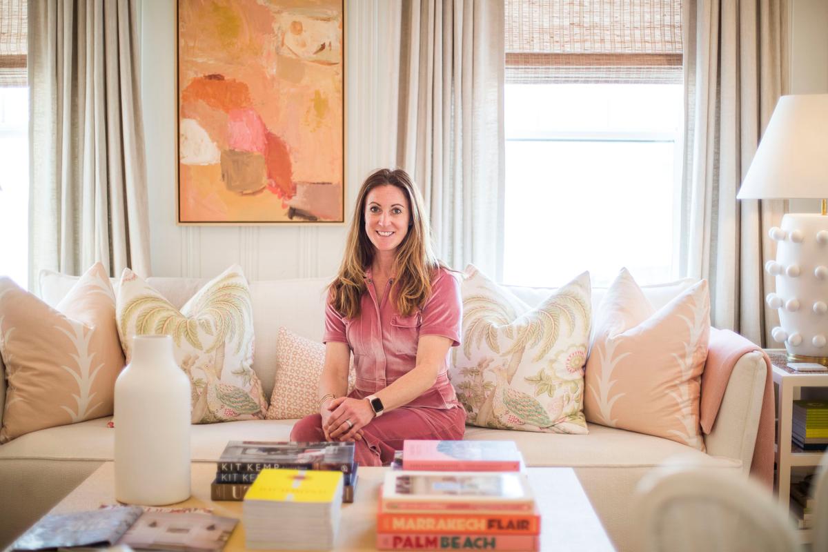 Katie Denton, owner of Bees Nees, in one of her renovated pink cottages, The Libby. It's used as a work space for her company. (Kendall Warner/The Virginian-Pilot/TNS)