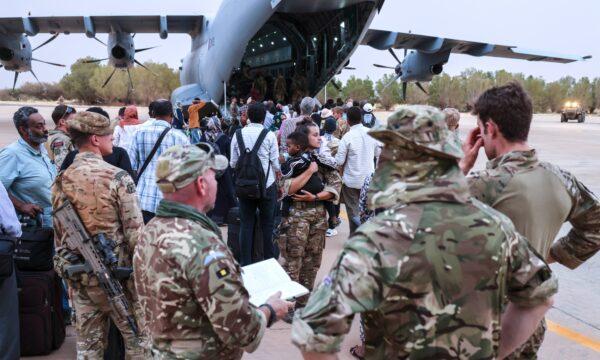 Evacuation of British Nationals onto an awaiting RAF aircraft at Wadi Seidna Air Base in Khartoum, Sudan, on April 27, 2023. (Ministry of Defence via PA Media)