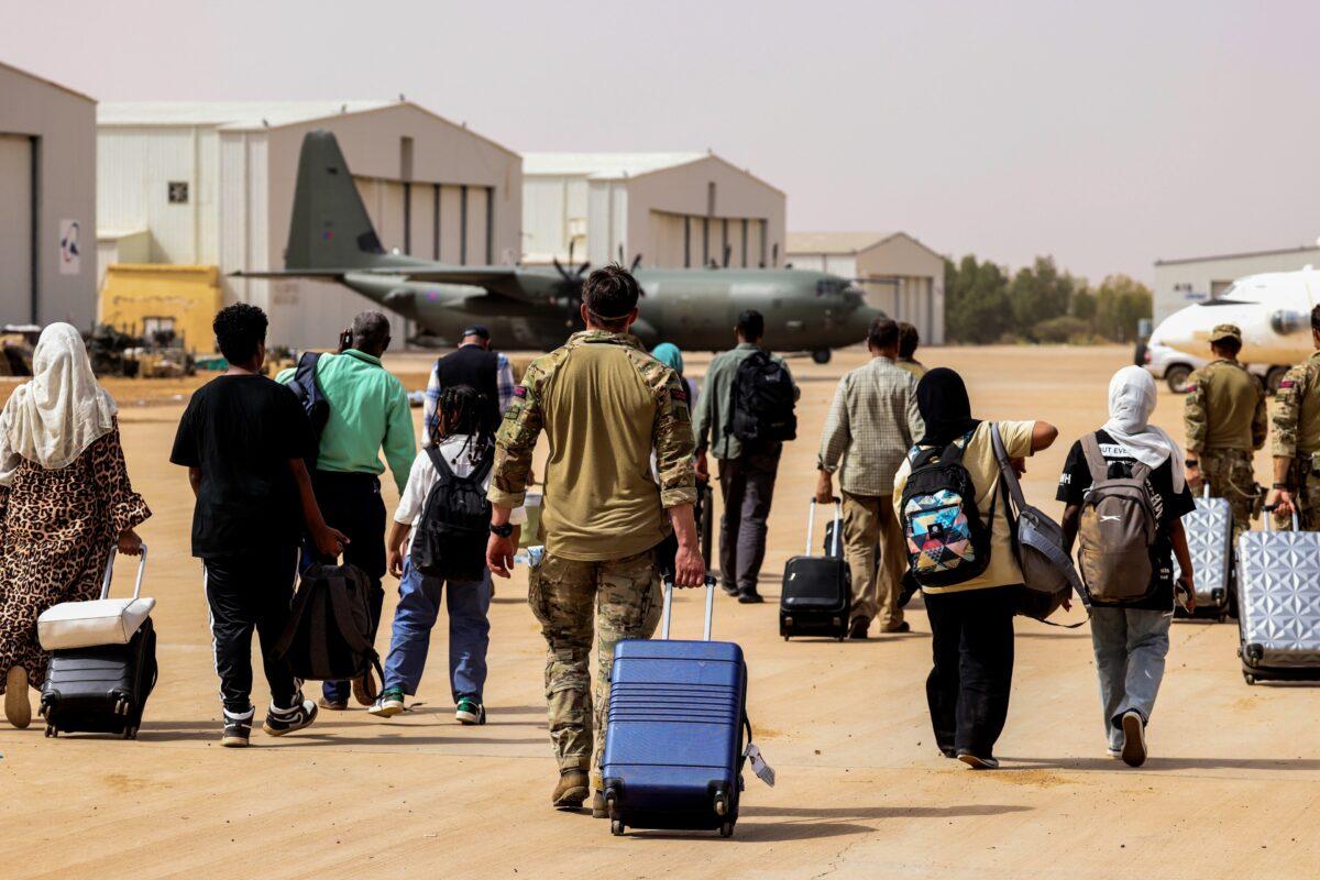 Evacuation of British Nationals onto an awaiting RAF aircraft at Wadi Seidna Air Base in Khartoum, Sudan, on April 27, 2023. (Ministry of Defence/handout via PA)