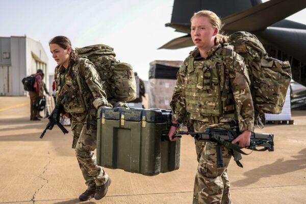 Medics from the Duke of Lancaster's Regiment of the British Army carry medical equipment as they arrive at Wadi Seidna airport in Khartoum, Sudan, on April 27, 2023. (UK Ministry of Defence via Getty Images)