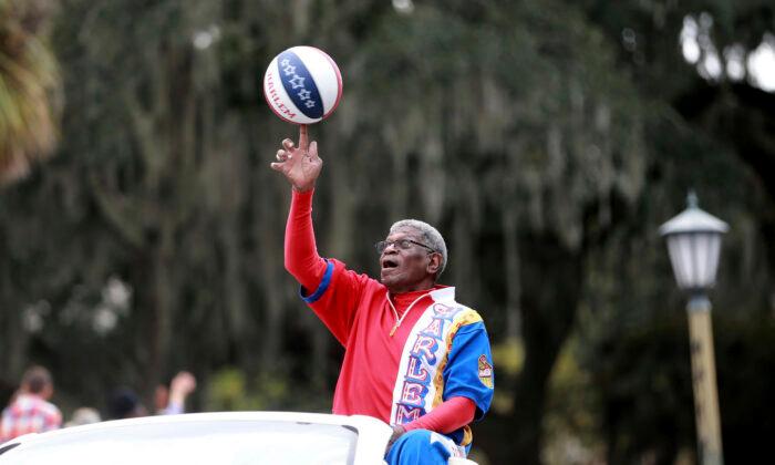 Basketball Legend Rivers, Longtime Globetrotter, Dies at 73