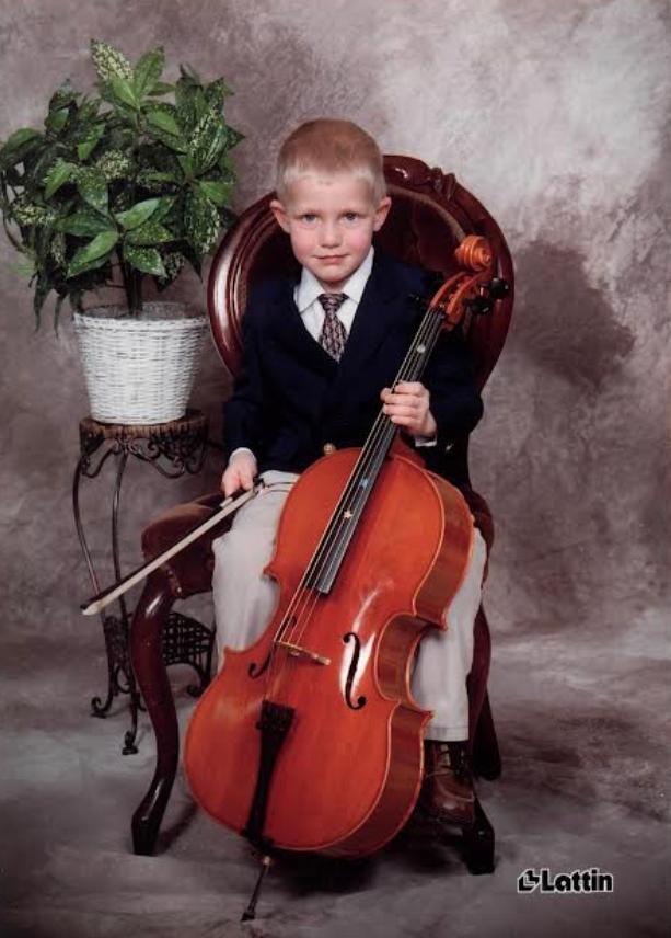 Silas as a young boy with his cello. (Courtesy of <a href="https://ffm.to/youngoriginal">Young Original</a>)