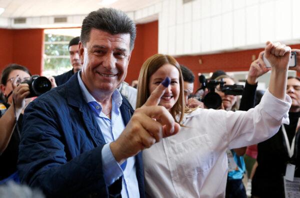 Paraguay's main opposition presidential candidate and leader of the center-left Concertacion Nacional coalition Efraín Alegre, gestures after voting during elections, in Lambaré, Paraguay, on April 30, 2023. Cesar Olmedo/Reuters)