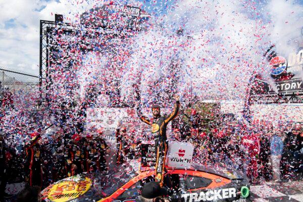 Martin Truex Jr. (C) celebrates in Victory Lane after winning the NASCAR 400 auto race at Dover Motor Speedway in Dover, Del., on May 1, 2023. (Jason Minto/AP Photo)