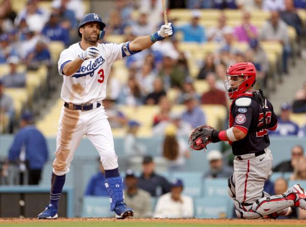 Chris Taylor (3) of the Los Angeles Dodgers reacts to his strikeout with the bases loaded in front of Keibert Ruiz (20) of the Washington Nationals, during the fourth inning at Dodger Stadium in Los Angeles on May 31, 2023. (Harry How/Getty Images)