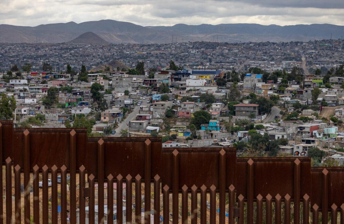 Tijuana, Mexico seen through the US border wall near San Diego, Calif., on May 31, 2023. (John Fredricks/The Epoch Times)