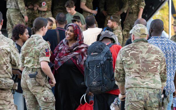 UK military personnel helping evacuees at Wadi Seidna airport in Khartoum, Sudan, on April 29, 2023. (Sgt. Paul Oldfield/UK Ministry of Defence via PA Media)