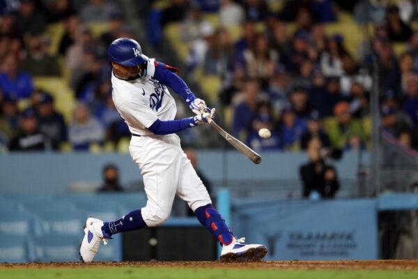 Mookie Betts (50) of the Los Angeles Dodgers hits a two-run ground-rule double in the fifth inning against the Philadelphia Phillies at Dodger Stadium in Los Angeles on May 1, 2023. (Katelyn Mulcahy/Getty Images)