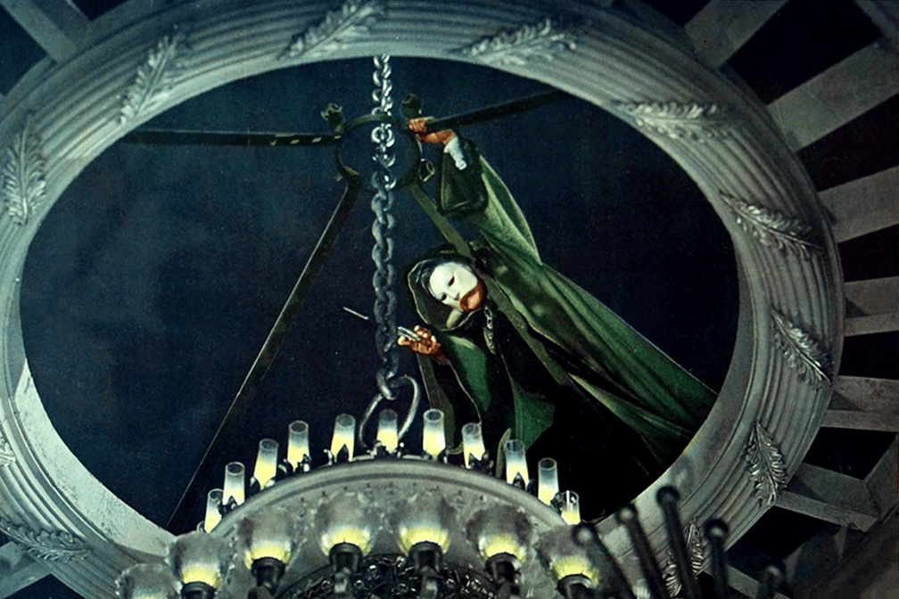 Cropped and edited lobby card for the 1943 version of "Phantom of the Opera," featuring Claude Rains. (Public Domain)