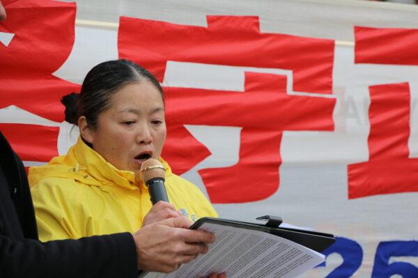 Huang Hua, a Falun Gong adherent, speaks at a rally outside of the Chinese Consulate in Toronto, on April 25, 2023. Huang said family members in China face continued harassment and intimidation from the communist authorities. (Andrew Chen/The Epoch Times)