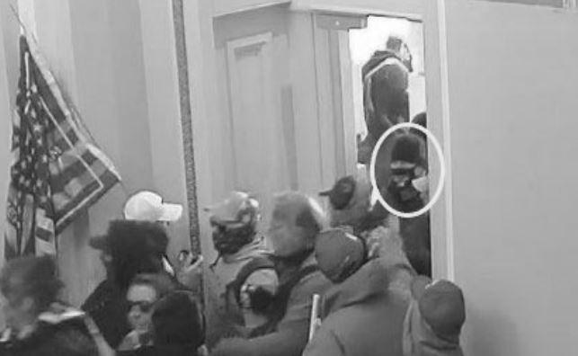 This image from video footage shows a crowd, including former FBI supervisor Jared Wise, inside the U.S. Capitol on Jan. 6, 2021. (Department of Justice via The Epoch Times)