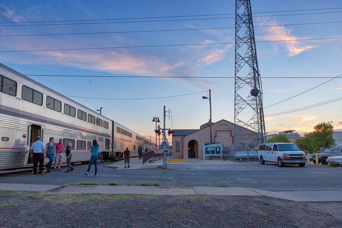 Passengers board and disembark the Sunset Limited at a train station in Alpine, Texas. (Courtesy of Amtrak)