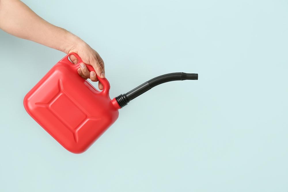 While it's unwise to store a gas can full of fuel in the vehicle, it's a good idea to have an empty gas container handy in case you run out of fuel. (Pixel-Shot/Shutterstock)