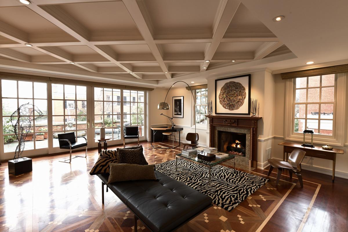 The spacious suite's unique features include the fireplace surrounds and exquisite woodworking. (Courtesy of Sean Shanahan, Elle Pouchetages, toptenreastatedeals.com)