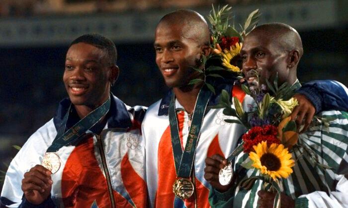 Calvin Davis, Olympic Medalist in 400 Hurdles, Dies at 51