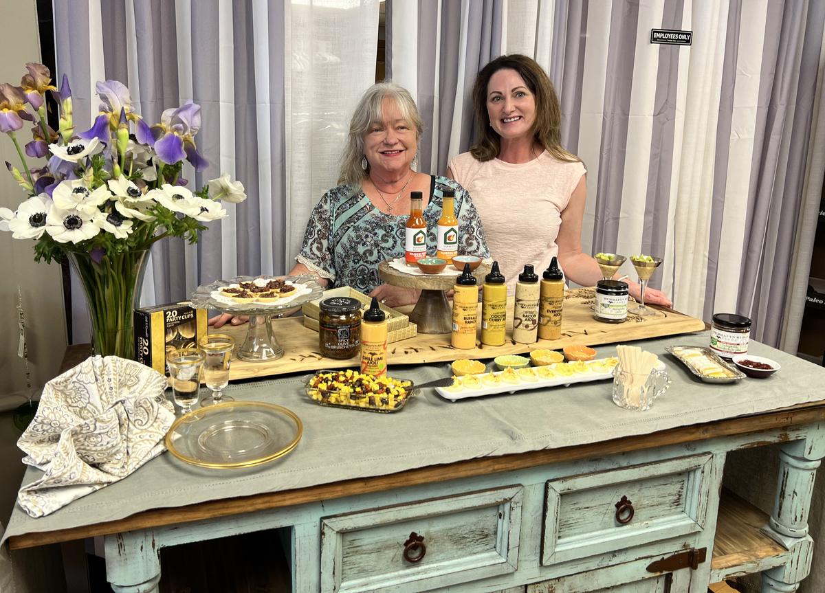 Mountain Life Mercantile, one of the shops of Blairsville’s downtown squares, offers tasting tables on the weekend so guests can sample Southern fare. Here, the shop’s Sarah Gazzara and Jen Rushing showcase deviled eggs with local sauces and jams. (Mary Ann Anderson/TNS)