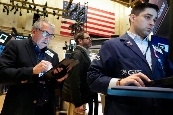 Traders work on the floor at the New York Stock Exchange in New York on May 3, 2023. (Seth Wenig/AP Photo)