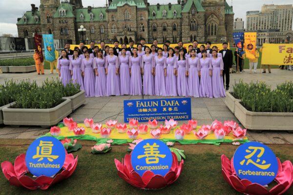 Falun Dafa adherents perform a song at an event celebrating World Falun Dafa Day on Parliament Hill in Ottawa on May 3, 2023. (Jonathan Ren/The Epoch Times)