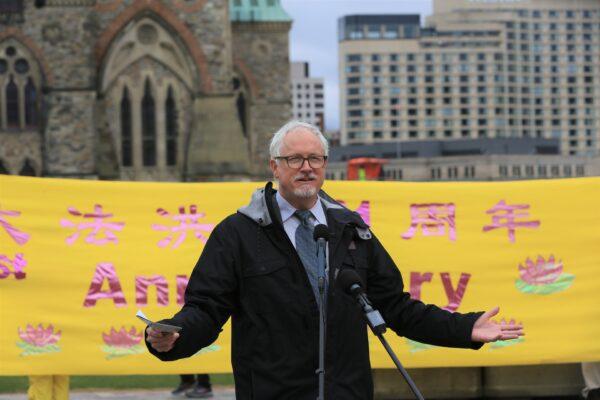 Conservative MP Colin Carrie speaks at a rally to celebrate World Falun Dafa Day on Parliament Hill in Ottawa on May 3, 2023. (Jonathan Ren/The Epoch Times)