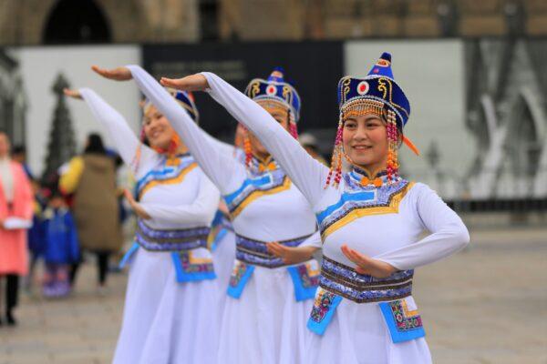 Falun Dafa adherents present a traditional Chinese dance performance to celebrate World Falun Dafa Day on Parliament Hill in Ottawa on May 3, 2023. (Jonathan Ren/The Epoch Times)