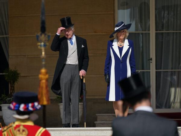 King Charles III and Camilla, Queen Consort during the Garden Party at Buckingham Palace ahead of the coronation of King Charles III and the Queen Consort at Buckingham Palace in London, England, on May 3, 2023. (Yui Mok/WPA Pool/Getty Images)