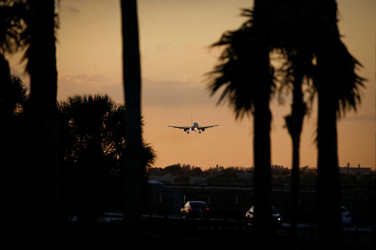 An aircraft approaches to land at Miami International Airport in Miami, Florida, on January 2, 2023. (Marco Bello/Reuters)