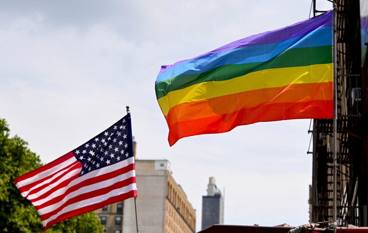 A U.S. flag and Pride flag are flown in Chelsea, New York City, on June 20, 2020. (Jamie McCarthy/Getty Images)