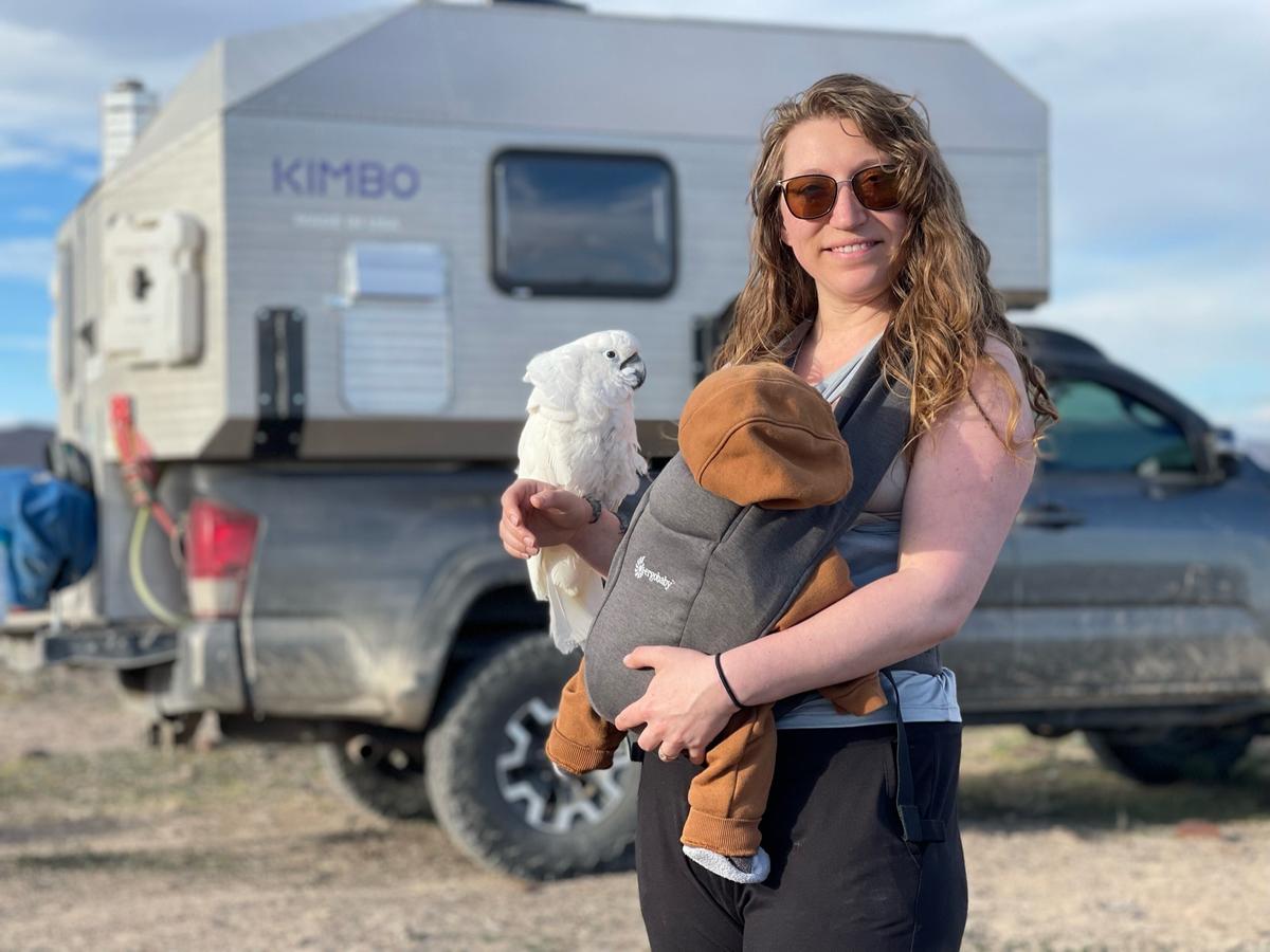 Emma the cockatoo with Riley and her daughter. (Courtesy of <a href="https://www.instagram.com/campingcockatoo/">Emma the Camping Cockato</a>)