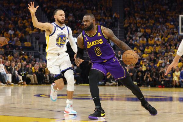 LeBron James (6) of the Los Angeles Lakers is guarded by Stephen Curry (30) of the Golden State Warriors during the first quarter of game two of the Western Conference Semifinal Playoffs at Chase Center at Chase Center in San Francisco on May 4, 2023. (Ezra Shaw/Getty Images)