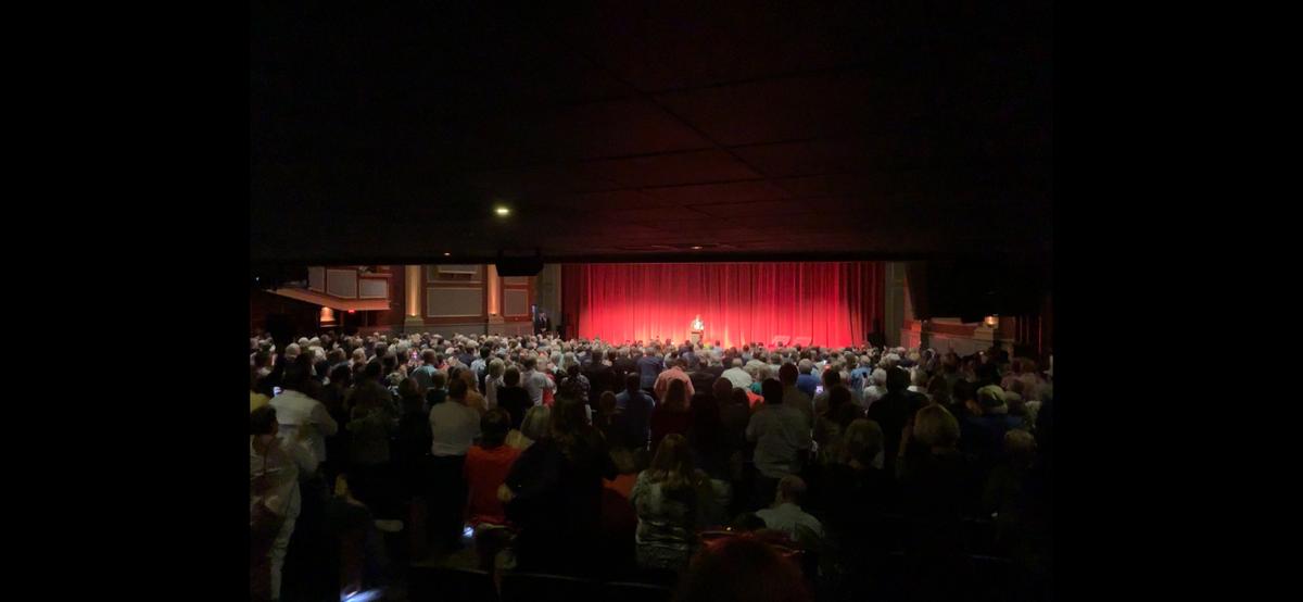 Former Fox News host Tucker Carlson receives a standing ovation at the beginning of his speech at the Oxford Performing Arts Center, on May 4, 2023. (Gary Bai/ The Epoch Times)