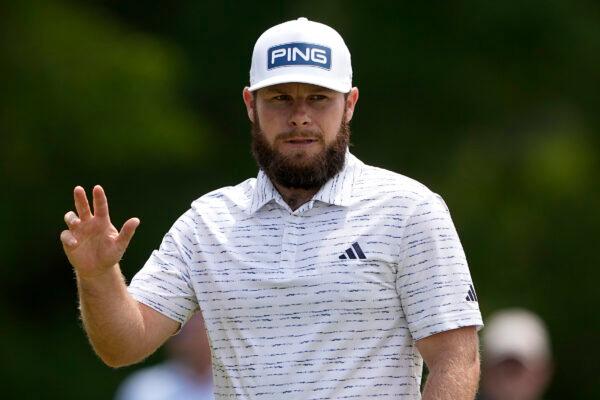 Tyrrell Hatton, of England, waves after his birdie putt on the ninth hole during second round of the Wells Fargo Championship golf tournament at the Quail Hollow Club in Charlotte, N.C., on Friday, May 5, 2023. (Chris Carlson/AP Photo)