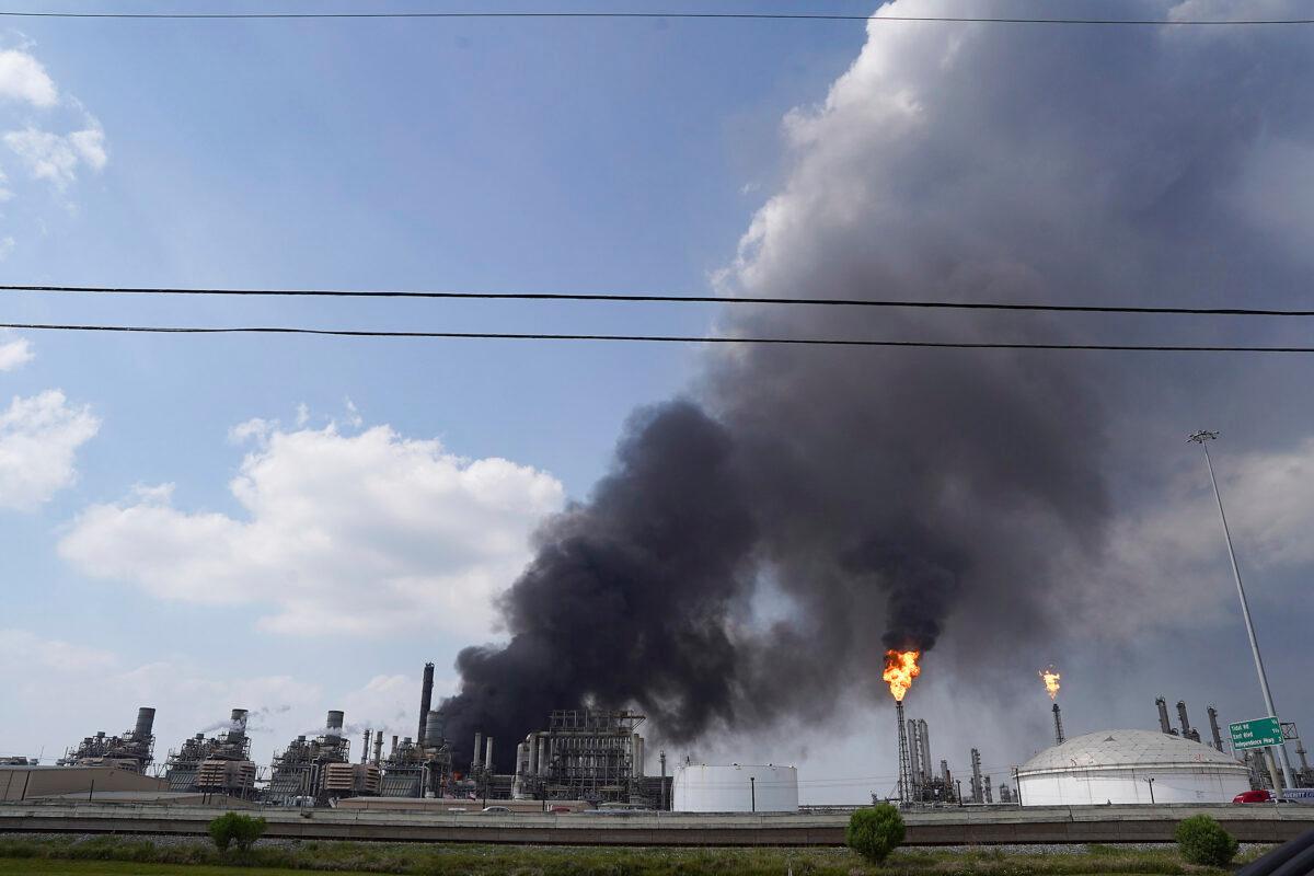 A fire burns at a Shell chemical facility in Deer Park, east of Houston, on May 5, 2023. (Elizabeth Conley/Houston Chronicle via AP)