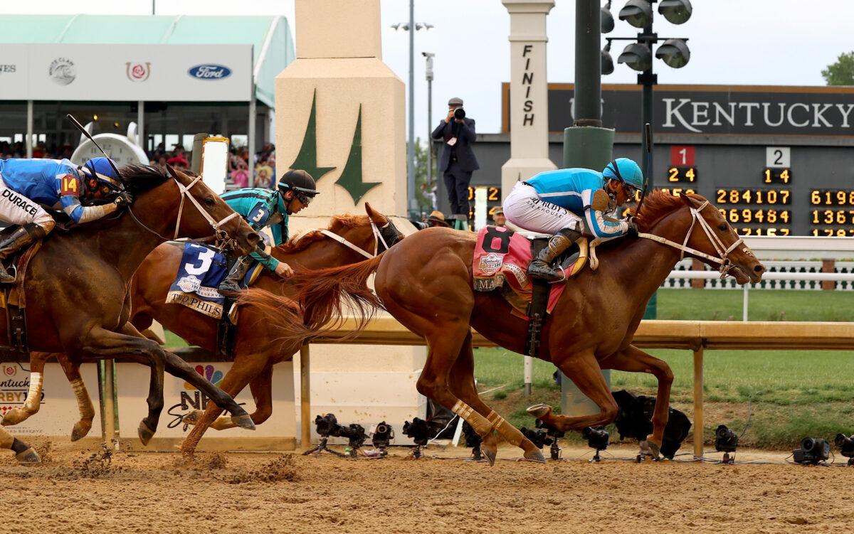 Mage, ridden by jockey Javier Castellano, crosses the finish line to win the 149th running of the Kentucky Derby at Churchill Downs in Louisville, Ky., on May 6, 2023. (Sam Mallon/Getty Images)