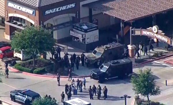A still image from video footage shows police responding to a shooting in the Dallas area's Allen Premium Outlets in Allen, Texas, on May 6, 2023. (WFAA TV via Reuters)