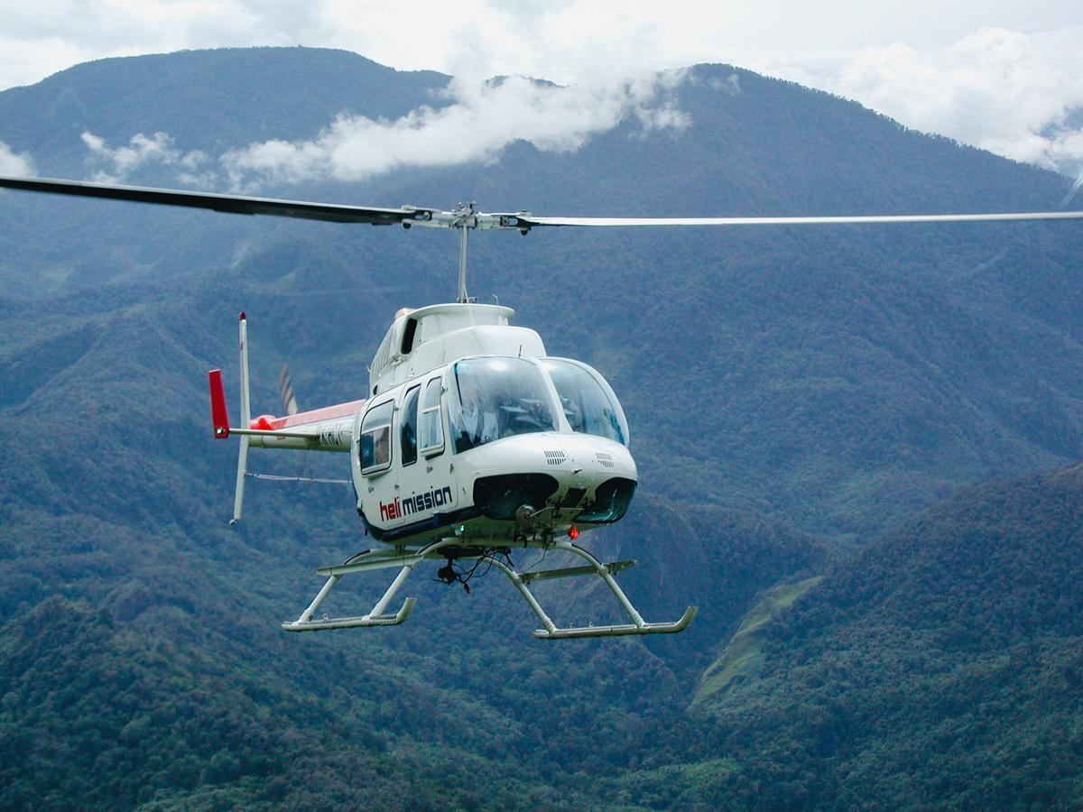 The Wild family required a helicopter to reach the Wano tribe in Papua, Indonesia. (Courtesy of <a href="https://www.wildbrothersproductions.com/off-the-couch-into-creation">The Wild Brothers</a>)