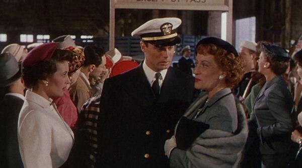 (L–R) : May Wynn (May Wynn), Ensign Willie Keith (Robert Francis), and Mrs. Keith (Katherine Warren), in “The Caine Mutiny.” (Columbia Pictures)