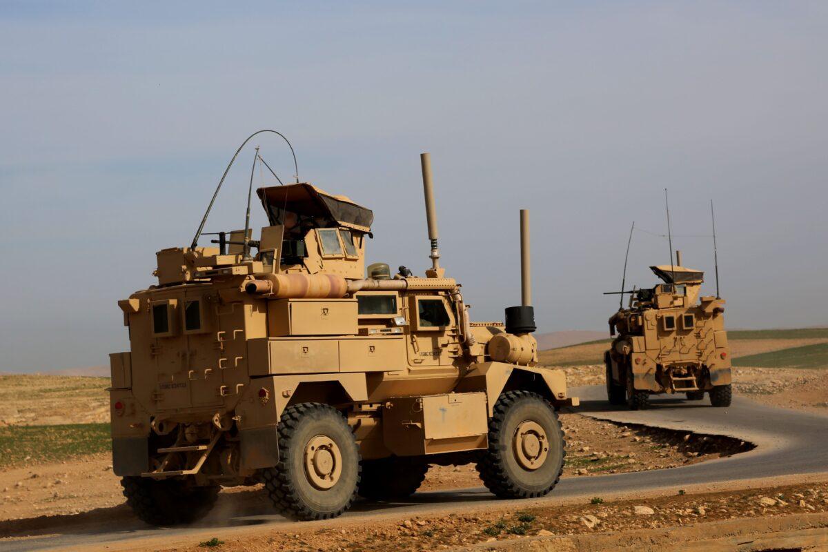 US-made armoured vehicles bearing markings of the US Marine Corps are seen on a road north of Raqa in northern Syria on March 27, 2017.<br/>(Delil Souleiman/AFP via Getty Images)