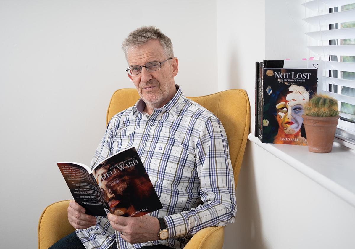 Author James Sale holding his book "HellWard: The English Cantos Volume One" (2020). (Courtesy of James Sale)