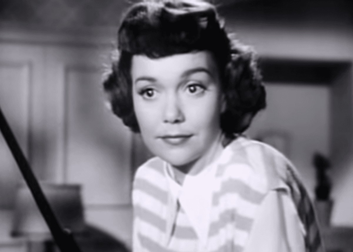 Cropped screenshot of Jane Wyman from the trailer for the film "A Kiss in the Dark" in 1949. (Public Domain)