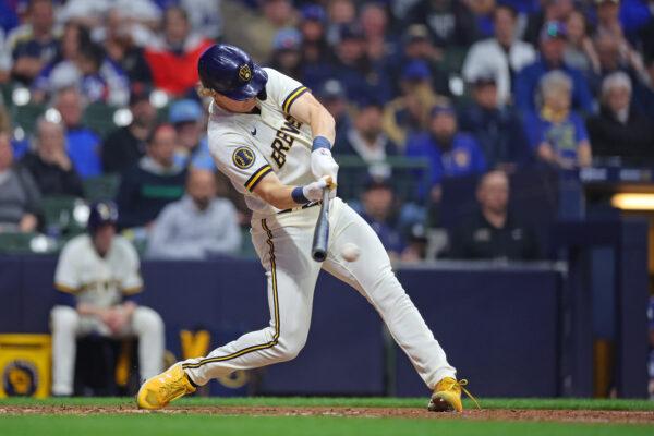 Joey Wiemer (28) of the Milwaukee Brewers hits an RBI double against the Los Angeles Dodgers during the seventh inning at American Family Field in Milwaukee on May 8, 2023. (Stacy Revere/Getty Images)